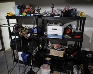 Hand tools, power tools, stacking storage shelves, flashlights, crockpot, cleaning supplies.