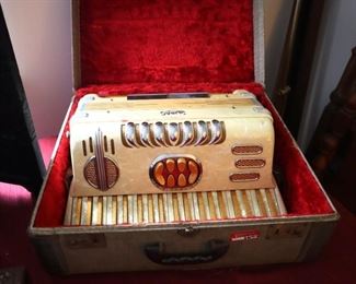 Lira accordion with original case, $150