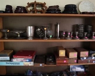 Rosewood stands, Sterling compotes $25 each, candlesticks $10 each, tableware $5-25, vintage & contemporary games $5-10 each 