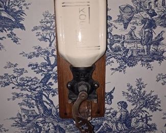 Antique wall mounted coffee grinder