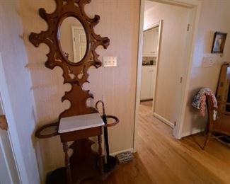 Antique Hall tree with marble top & cast iron removable round bottoms