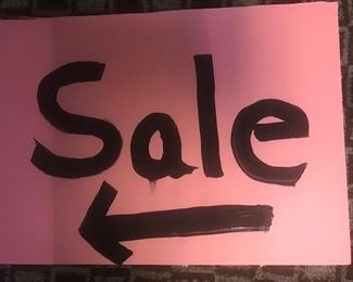 Look for our PINK SALE signs