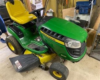 John Deere riding lawn mower, works great. Starts right up! Adjustable deck, adjustable speed, reverse gear.
