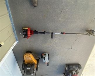 Red gas trimmer. Yellow Cub Cadet 2 wheel trimmer. Make you lawn work easier!