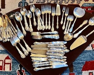 Item 26:  Towle "Fontana" Sterling Set:  $2395                                                             19 knives, 14 butter knives, 15 dinner forks, 16 salad forks, 16 soup spoons, 17 teaspoons, (3) serving pieces, (5) condiment forks, (2) serving spoons, gravy ladle, lemon fork
