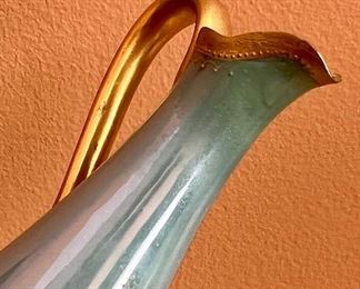 detail - please note the masterful repair underneath spout