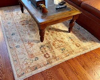 Item 120:  Wool Rug (cream & rust) - approx. 5' x 8' (please note the "lines" in the rug - maybe from a vacuum cleaner? They seem permanent!:  $175