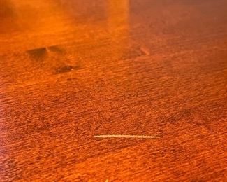 please note the scratch