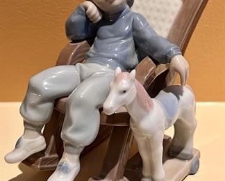 Item 126:  Lladro "All Tuckered Out" #5846:  $58