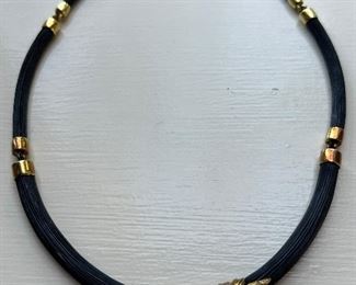 Item 197:  14K Egyptian Necklace with Lion Faces coupled with Elephant Hair and jointed gold - 7":  $750