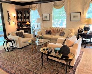 Custom white velvet chairs; vintage Baker octagonal side table, brass and wood cocktail table.  You need all of this!