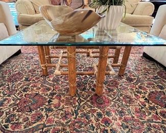 Vintage McGuire coffee table with Antique handmade Oriental rug