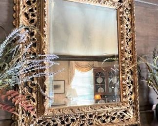 Antique Italian gilt mirror with hand beveled mirror