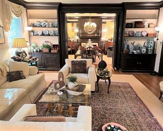 Asian porcelains, McGuire coffee table, Oriental rug, sisal rug.  Gorgeous furniture, great designer details.