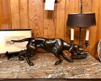 Handsome bronze sculpture of a hunting dog at point. Unsigned. Substantial weight. Beautiful work. 21 inches wide.