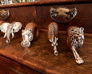 Wildlife napkin rings by South African artist Paul Gibb and Tony Prischi. Pewter and wood. Priced individually.