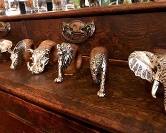 Wildlife napkin rings by South African artist Paul Gibb and Tony Prischi. Pewter and wood. Priced individually.