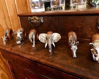 Wildlife napkin rings by South African artist Paul Gibb and Tony Prischi. Pewter and wood. Priced individually.