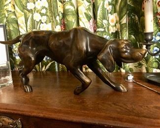 Handsome BRONZE SCULPTURE of a hunting dog at point. Unsigned. Substantial weight. Beautiful work. 21 inches wide.