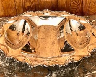 Oversized divided sterling silver serving bowl.