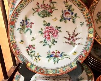 Chrysanthemum porcelain. Hand-decorated in Hong Kong. 12 salad plates, four dinner plates.