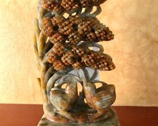 Hand carved Chinese soap stones. Birds beneath a stand of flowers.