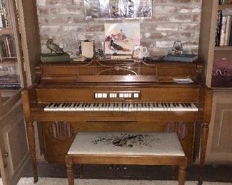 Store and Clark console piano and organ combination. Bench with needlework cushions by Virginia welder.
