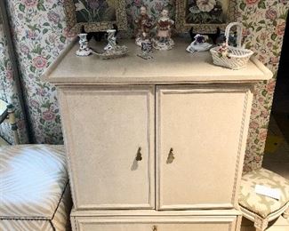 Ivory Palm Beach Regency cabinet. Opens from front and side. Brass door pulls on front and side. There are two matching cabinets. 