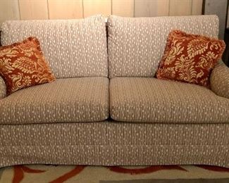 Neutral loveseat would fit easily in any decor
