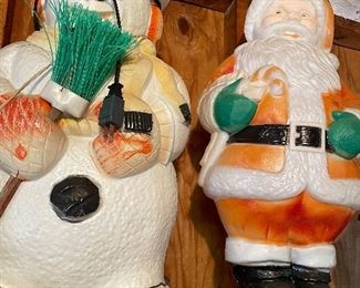 Vintage blow mold Santa Claus and Snowman.