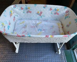 Vintage wicker bassinet.