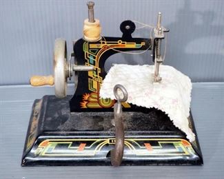 Vintage Casige #116 Toy Sewing Machine, Jar Of Buttons, Sewing Notions Lamp, Thread In Vintage Box, And Pins