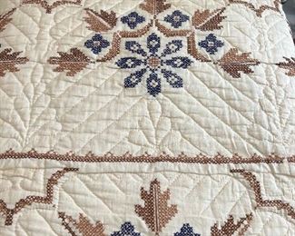 Antique cross stitch quilt