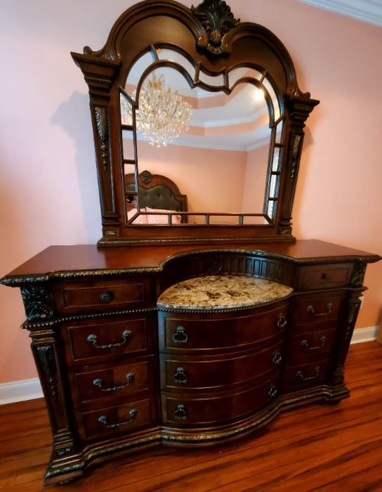 Absolutely gorgeous wood and granite dresser. Beautiful details on this pristine piece of furniture. Sold as a set with queen adjustable bed and two night stands.