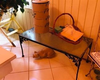 Vintage wrought iron porch set ivy motif
Coffee table with glass top