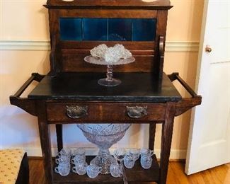 English tile back oak wash stand with towel bar