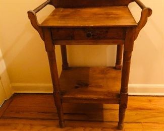 Small pine wash stand with turned towel bars and lower shelf. Circa 1900-1920