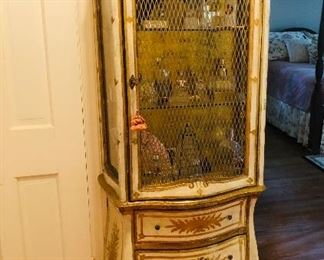 Curio cabinet white and gold leaf case with glass ends and Bess grill front and three drawers in bombe’ base. 5ft 3 in high x 21 in wide