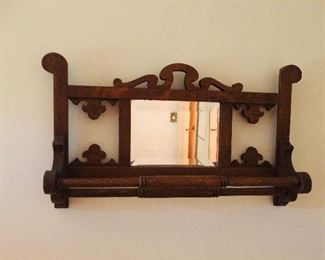 Victorian oak beveled glass mirror with double turned towel bars