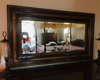 Mirror
Beveled glass in Victorian gilt and oak frame 
Circa 1890-1915
Mirror 40x17
Gesso gilt liner 6.5 inches wide