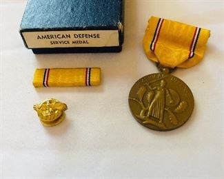 American defense service medal WW2.  This set is complete. Typically, the small piece is missing.