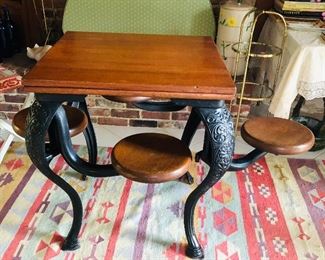 Ice cream table w/attached swing-out seats  w/cabriole legs, claw feet & oak top/seats c.1890's, a great old table in Exc cond,

This piece came from Mrs. Friedman’s fathers store in Pelham, Ga