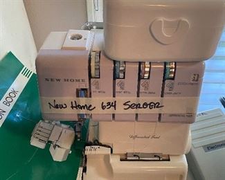 New Home 634 Serger machine with book