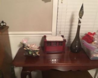 Sofa table & decor including plastic box holding napkins & napkin rings/holders
