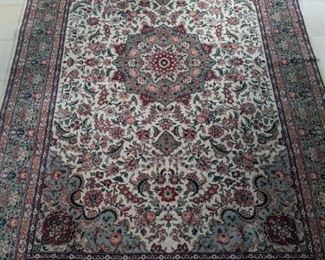 Vintage, hand-woven Persian Kashan rug, 100% wool face, measures 8' 11" x 5' 10".
