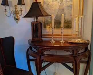 Antique Asian wooden demilune table, w/abacus table lamp and nicely framed/matted art, w/gallery light. 