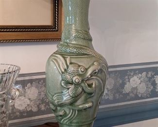 Close-up of one of the celadon green Asian porcelain table lamps, w/shade and finial.
