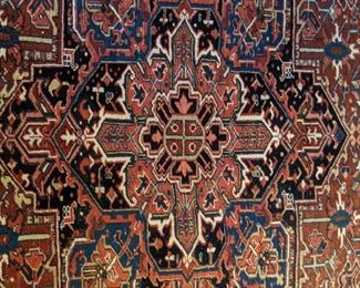 Close-up of the center medallion of the Persian Heriz rug.