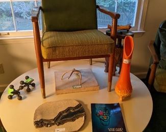 MCM chair, with it's new friend, an orange/yellow tall glass vase, 