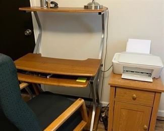 wooden desk and file cabinet